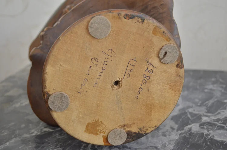 Mezzobusto di fanciullo in legno