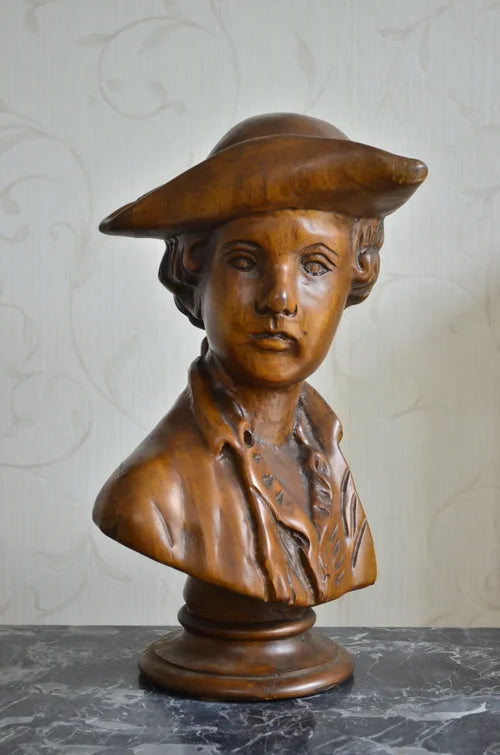Mezzobusto di fanciullo in legno