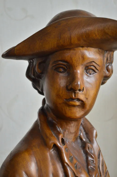 Mezzobusto di fanciullo in legno