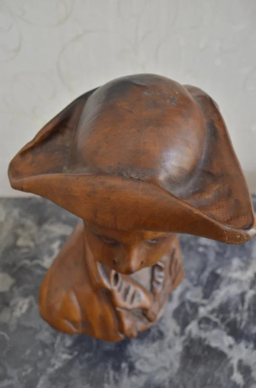 Mezzobusto di fanciullo in legno